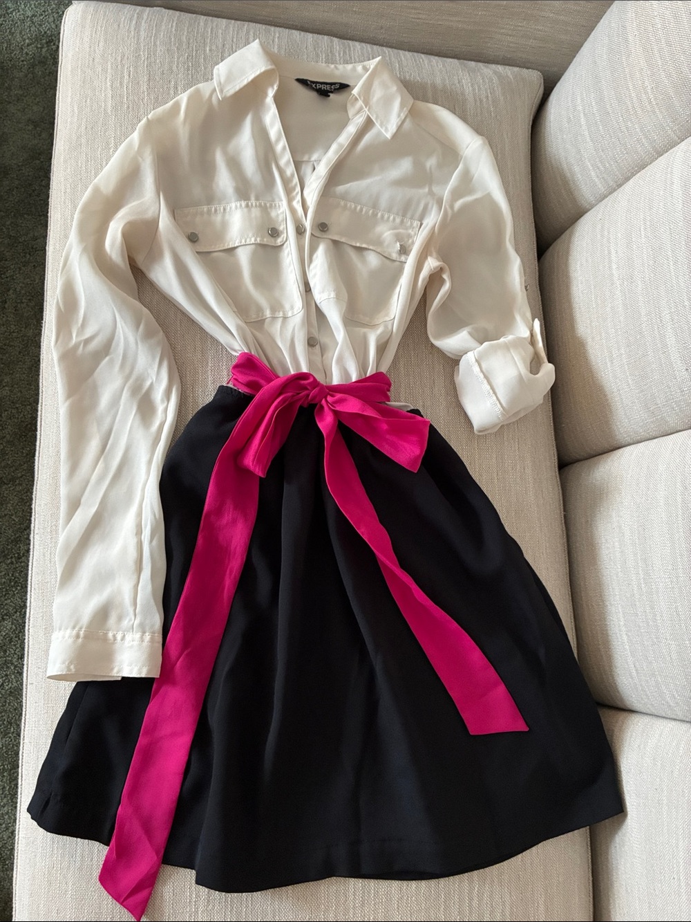 Express White Button-Up Shirt with Black Skirt and Fuchsia Sash